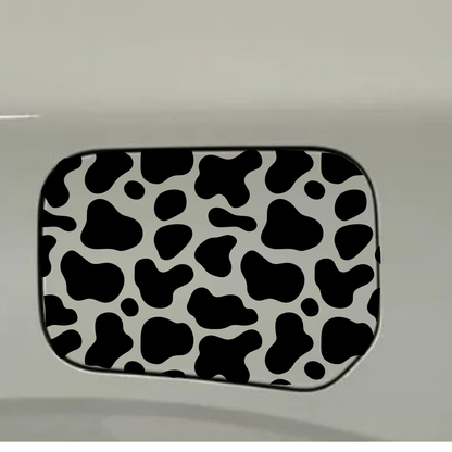 cow print gas tank door car decal vinyl fuel door decal black and white pattern applied to vehicle exterior