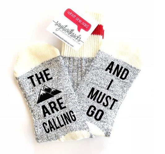 The Mountains Are Calling Socks - What She Said Creatives